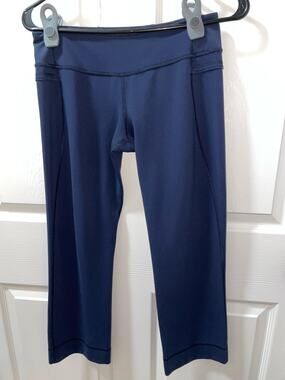 Lululemon.  Size 6 ladies . Navy cropped capris. Excellent condition,